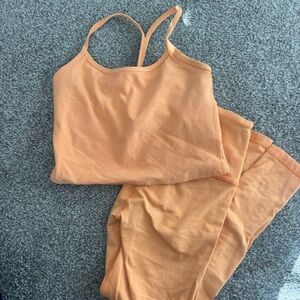Beyond yoga orange tank set size XS On hold